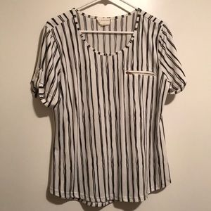 Black and white stripped short sleeved cuffed woman’s top